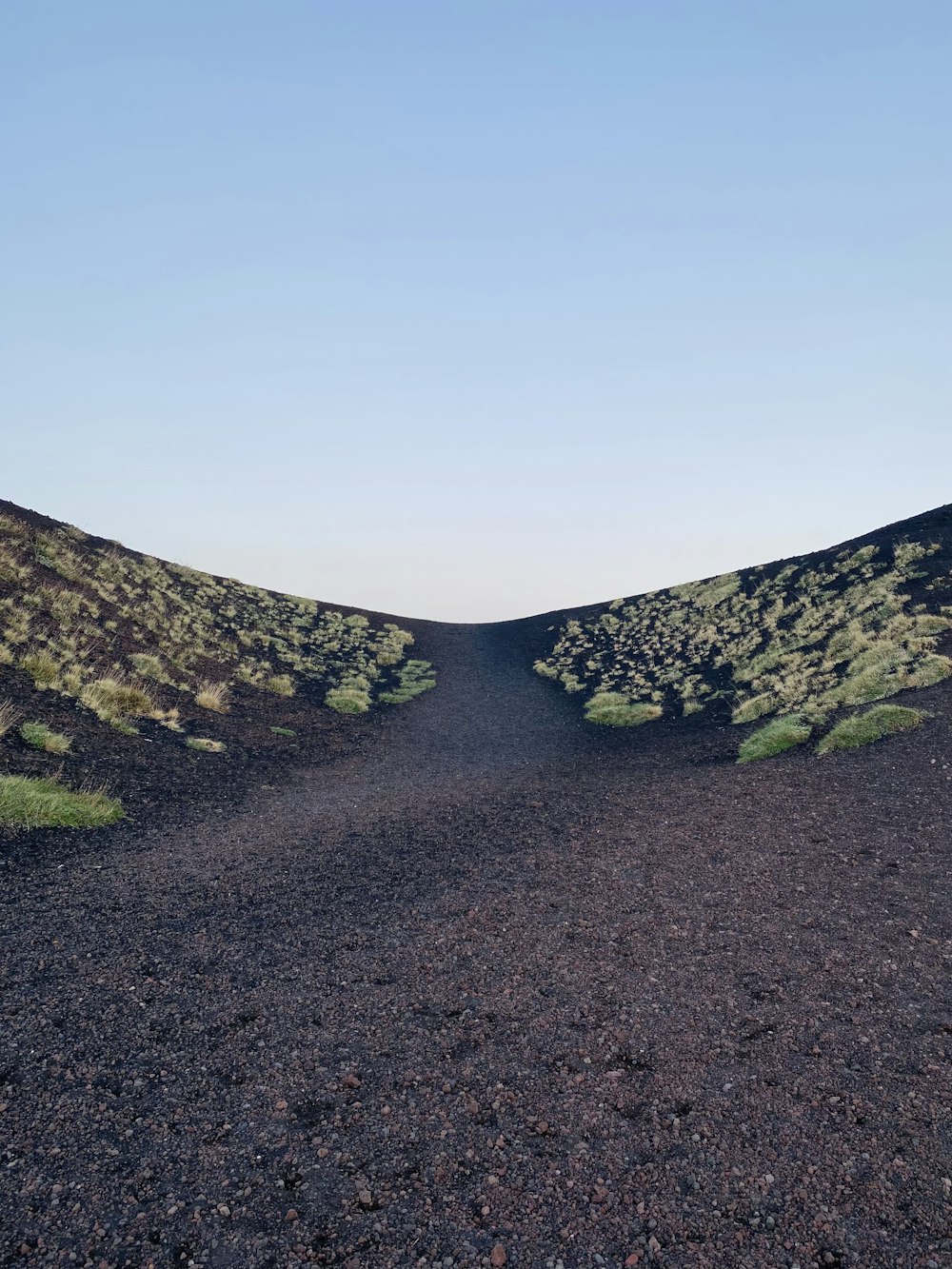 a dirt road in the middle of nowhere