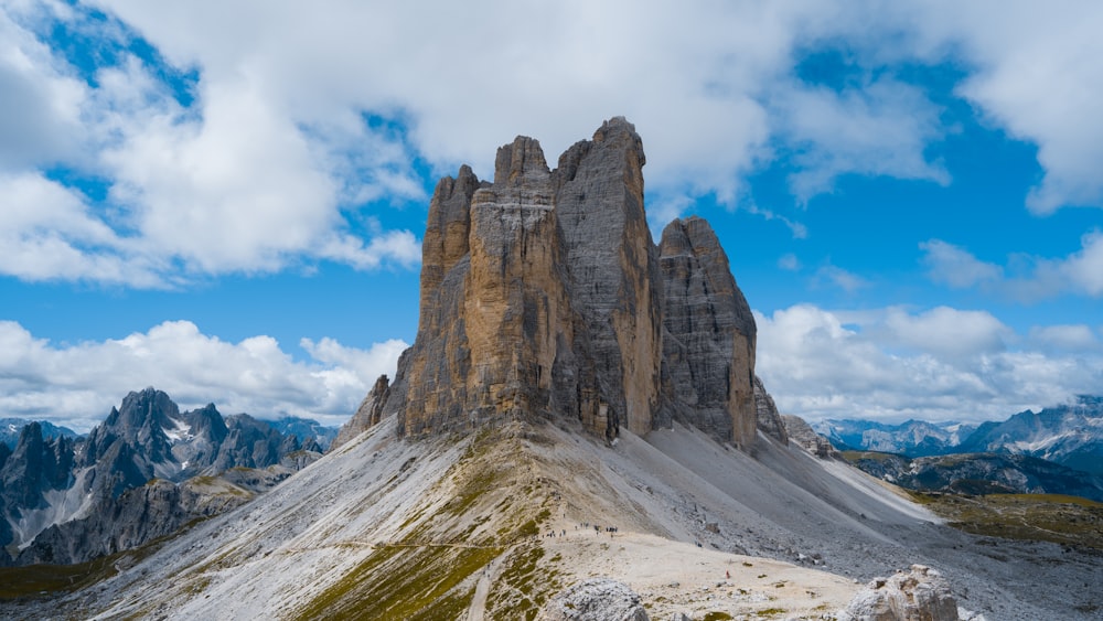 a very tall mountain with a sky background