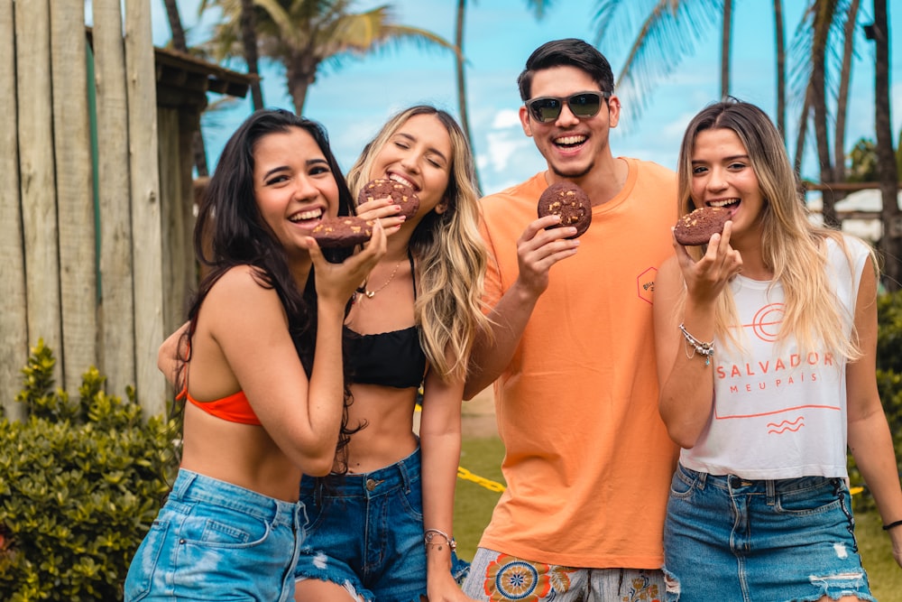 a group of young people standing next to each other