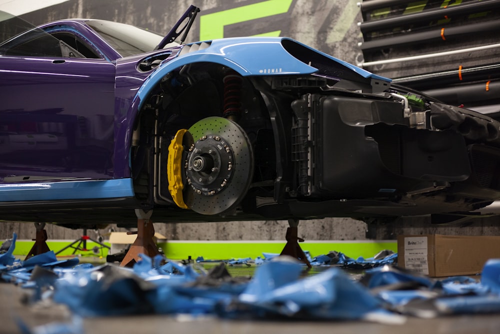 a car being worked on in a car body shop