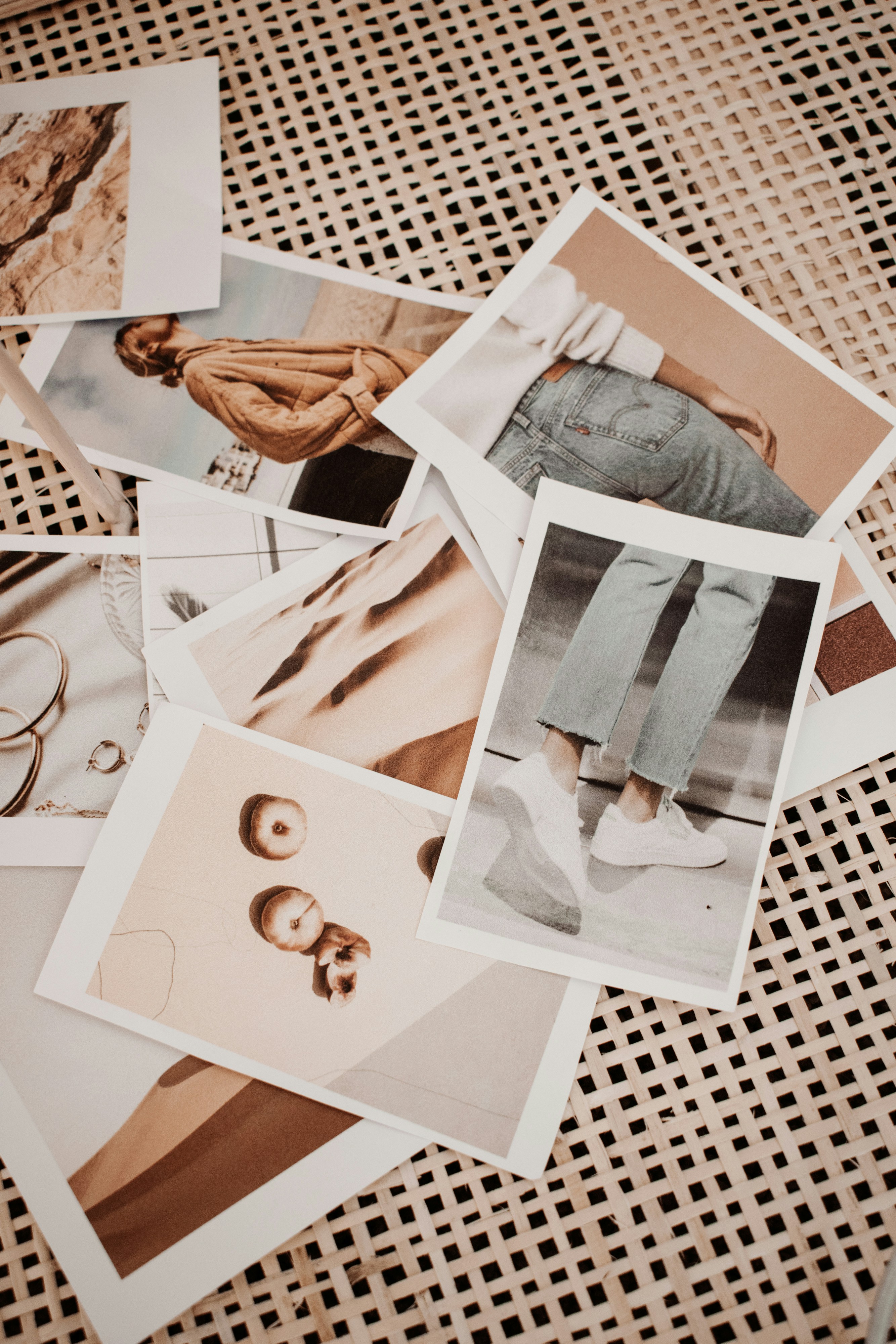 Moodboarding: Lifestyle images scattered across table