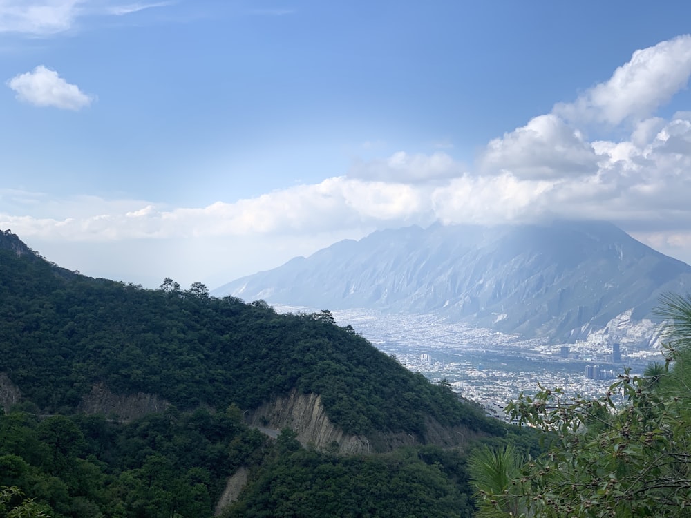 a scenic view of a city in the distance