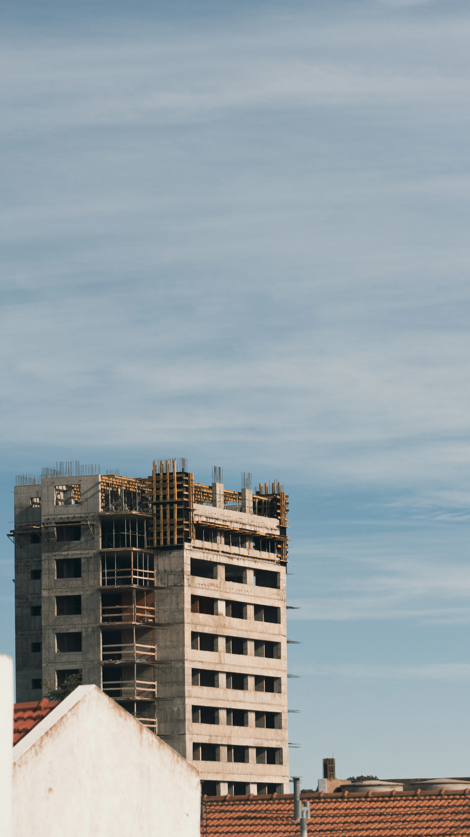 a tall building with scaffolding on top of it