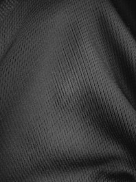 a close up view of a black polyester fabric