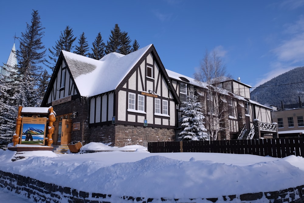 a large house with a lot of snow on the ground