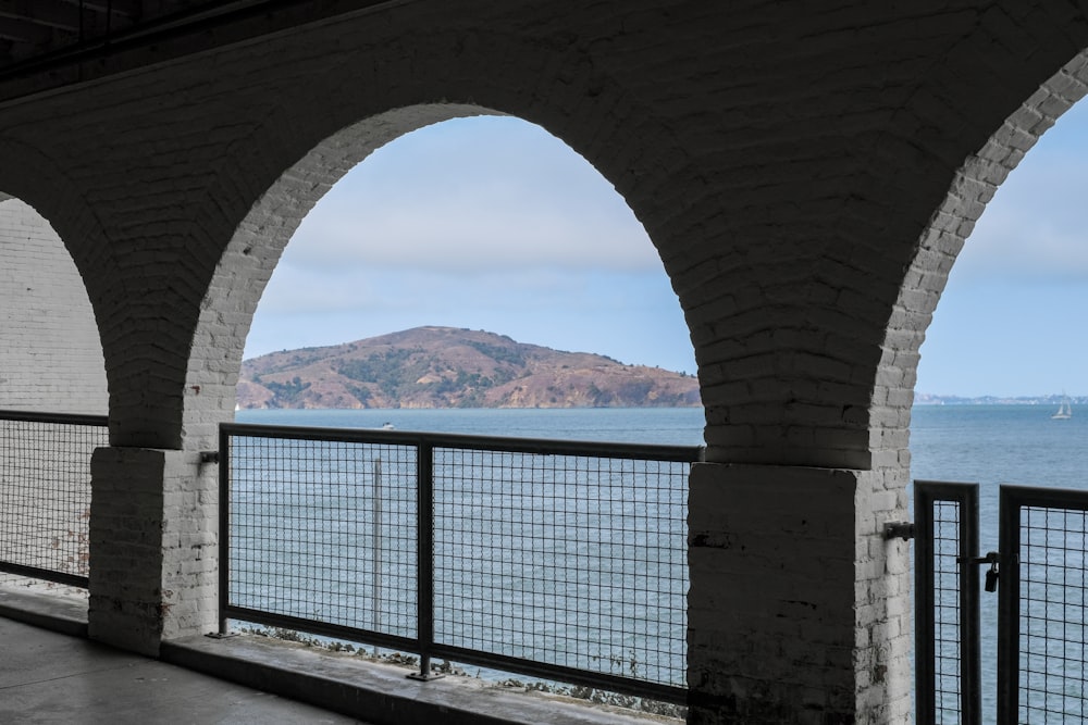 a view of a body of water from a bridge