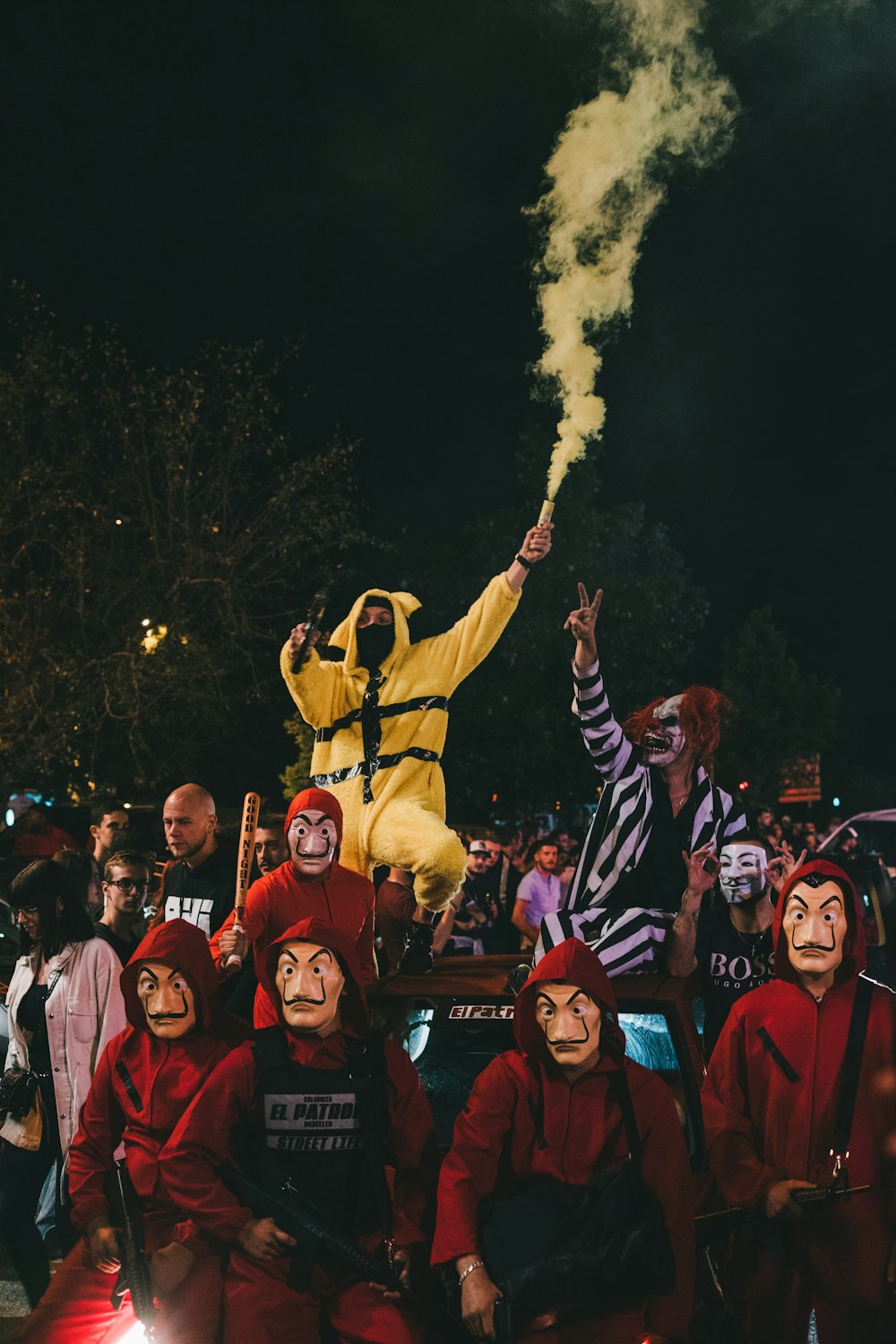 a group of people dressed in clown costumes