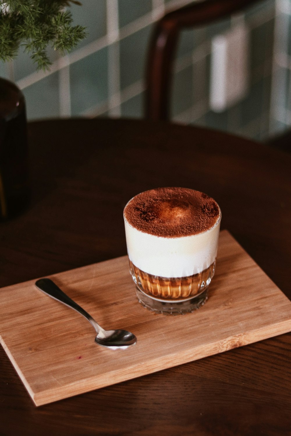 a dessert on a cutting board with a spoon