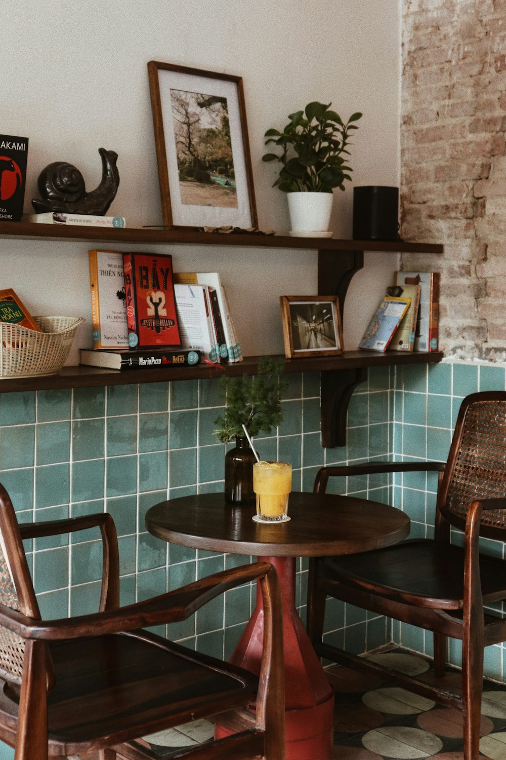 two chairs and a table in a room