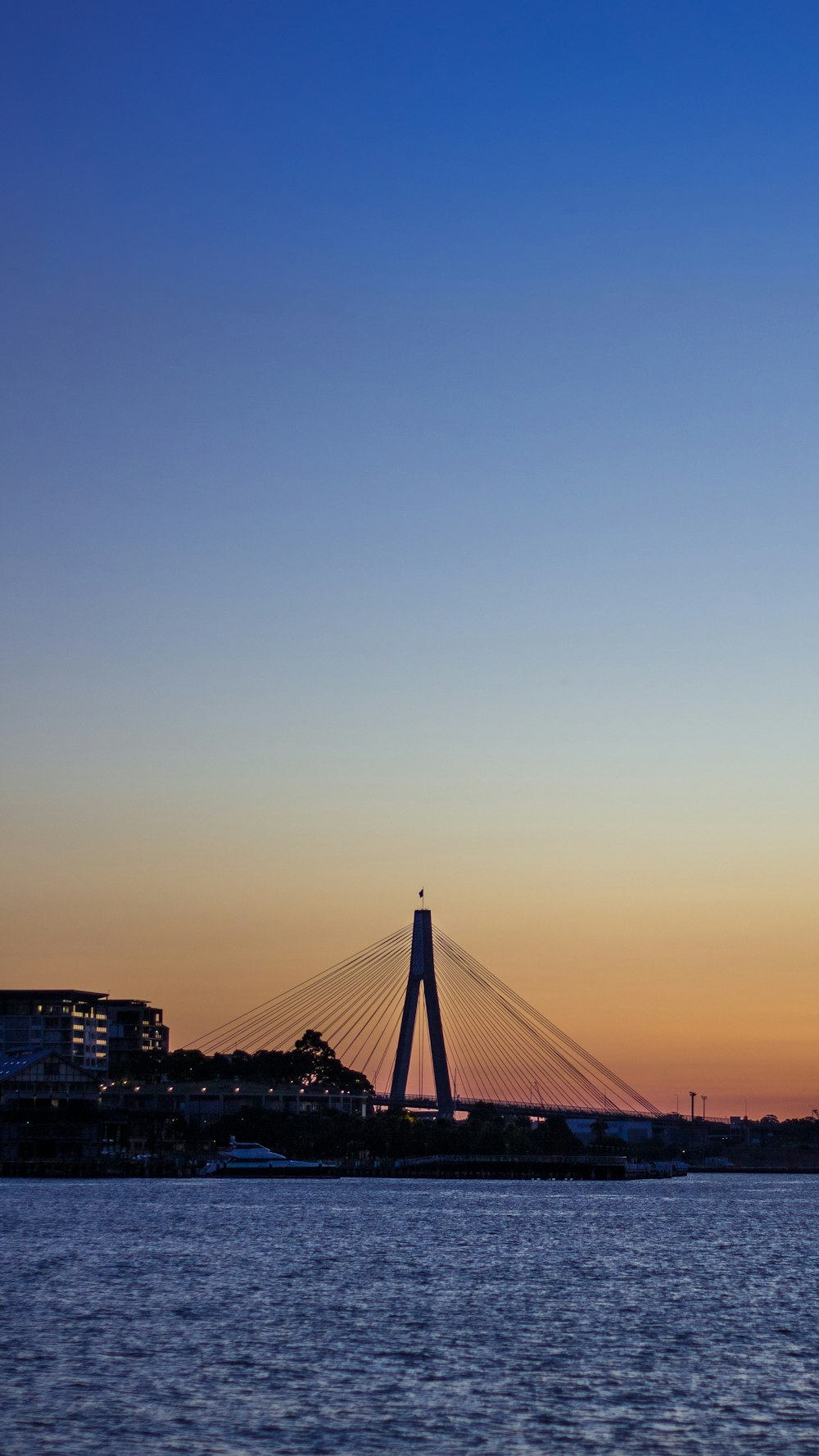 a large bridge spanning over a large body of water