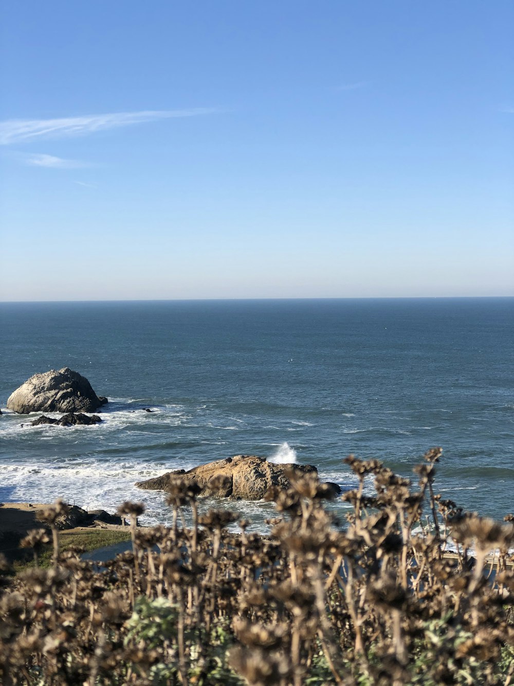 a view of a body of water from a hill