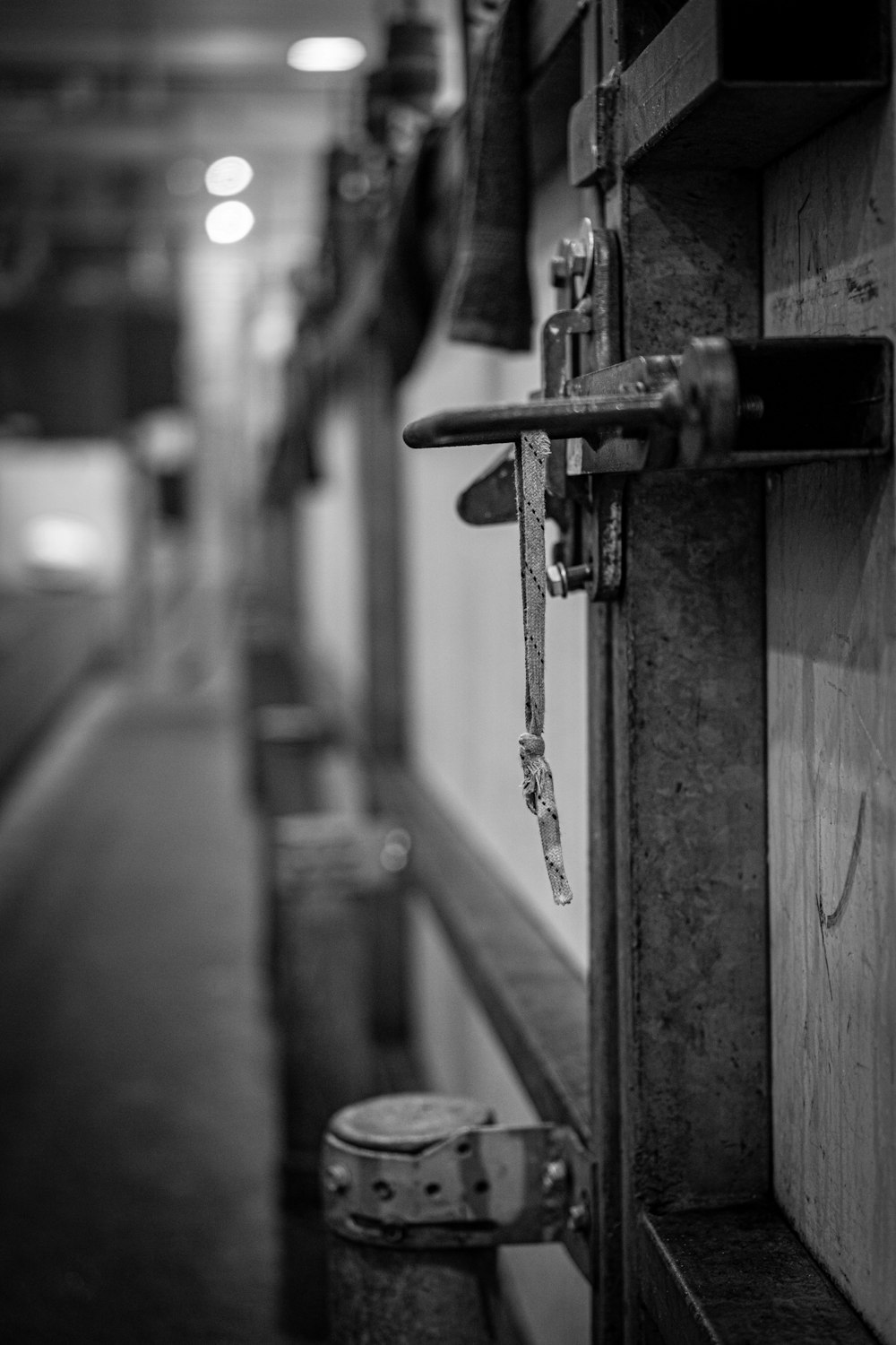 a black and white photo of a hallway