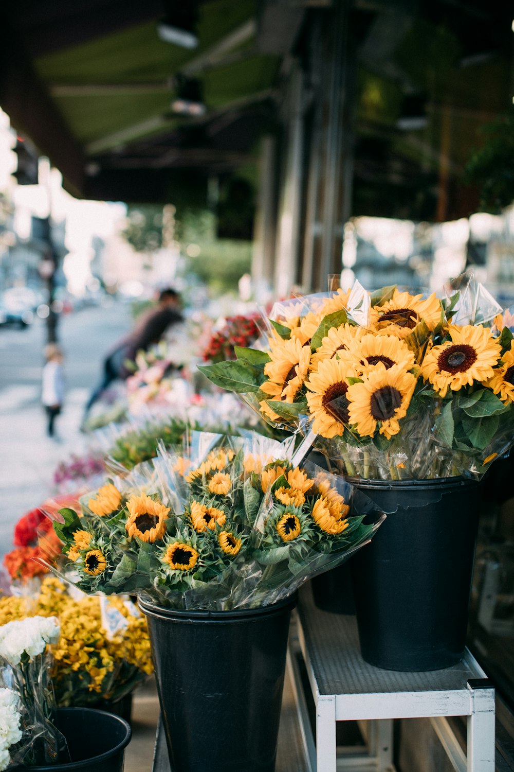 a bunch of sunflowers that are on a table