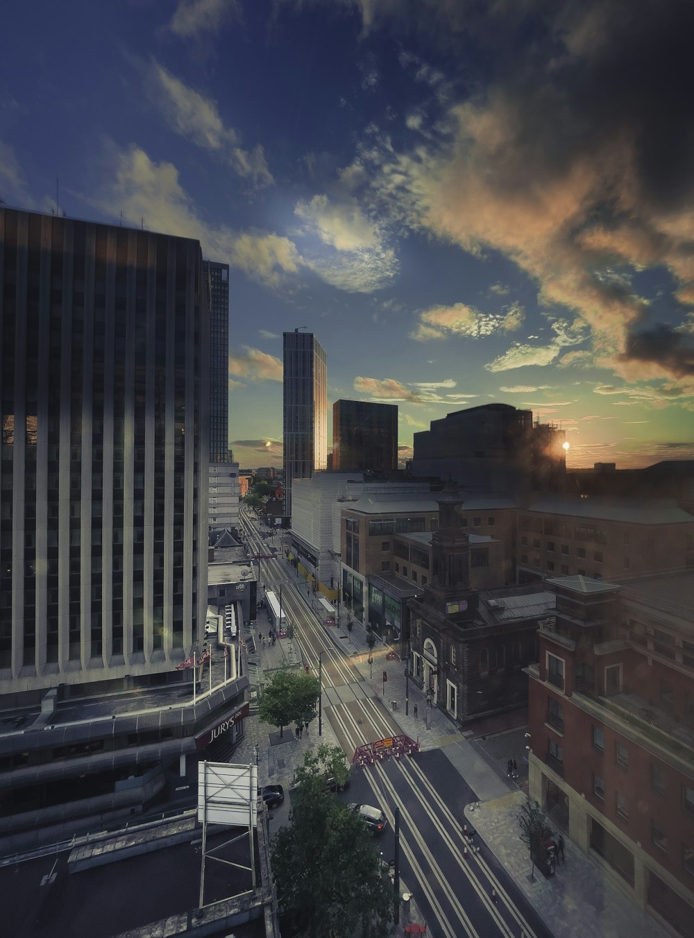 a view of a city street at sunset