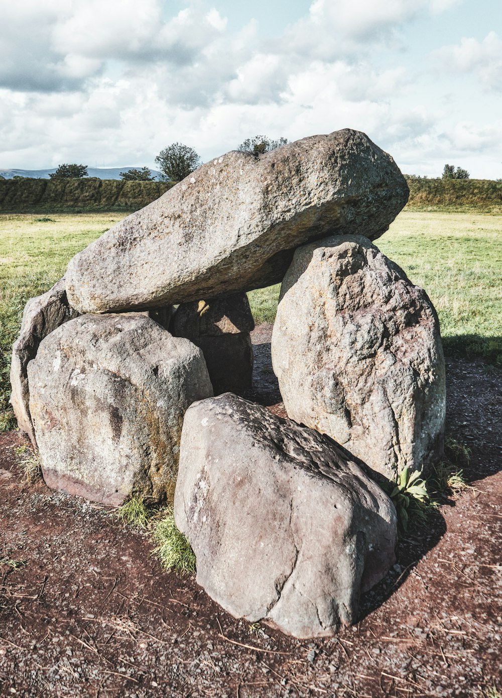 a large rock sitting on top of a pile of rocks