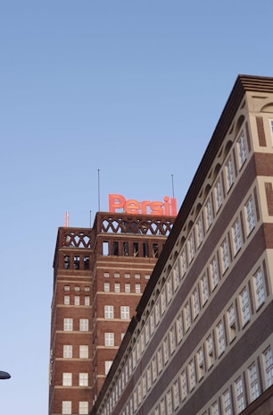 Persil laundry detergent pack with European quality badge, set against a spacious, bright layout.