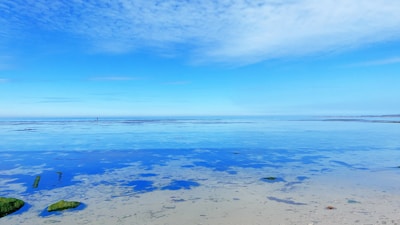 a view of the ocean from a beach