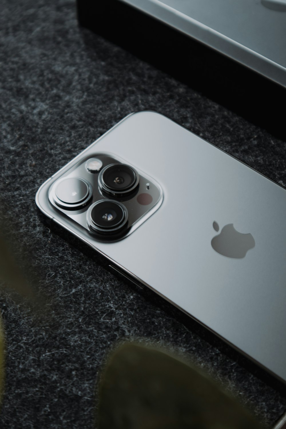 a close up of a cell phone on a table