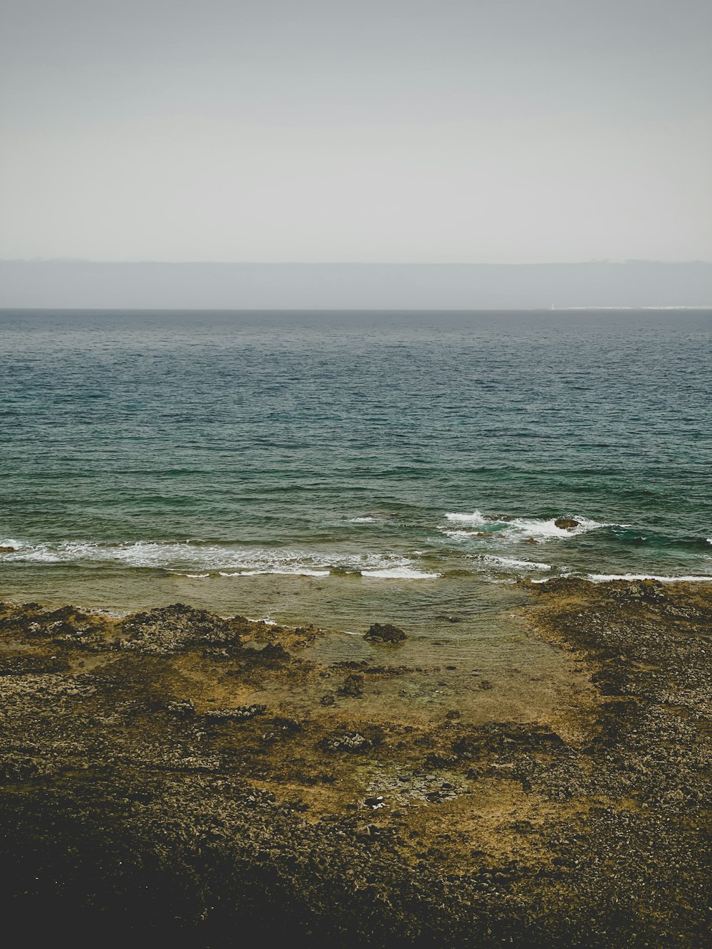 a lone boat is out on the ocean