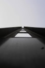a black and white photo of a bridge