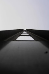 a black and white photo of a bridge