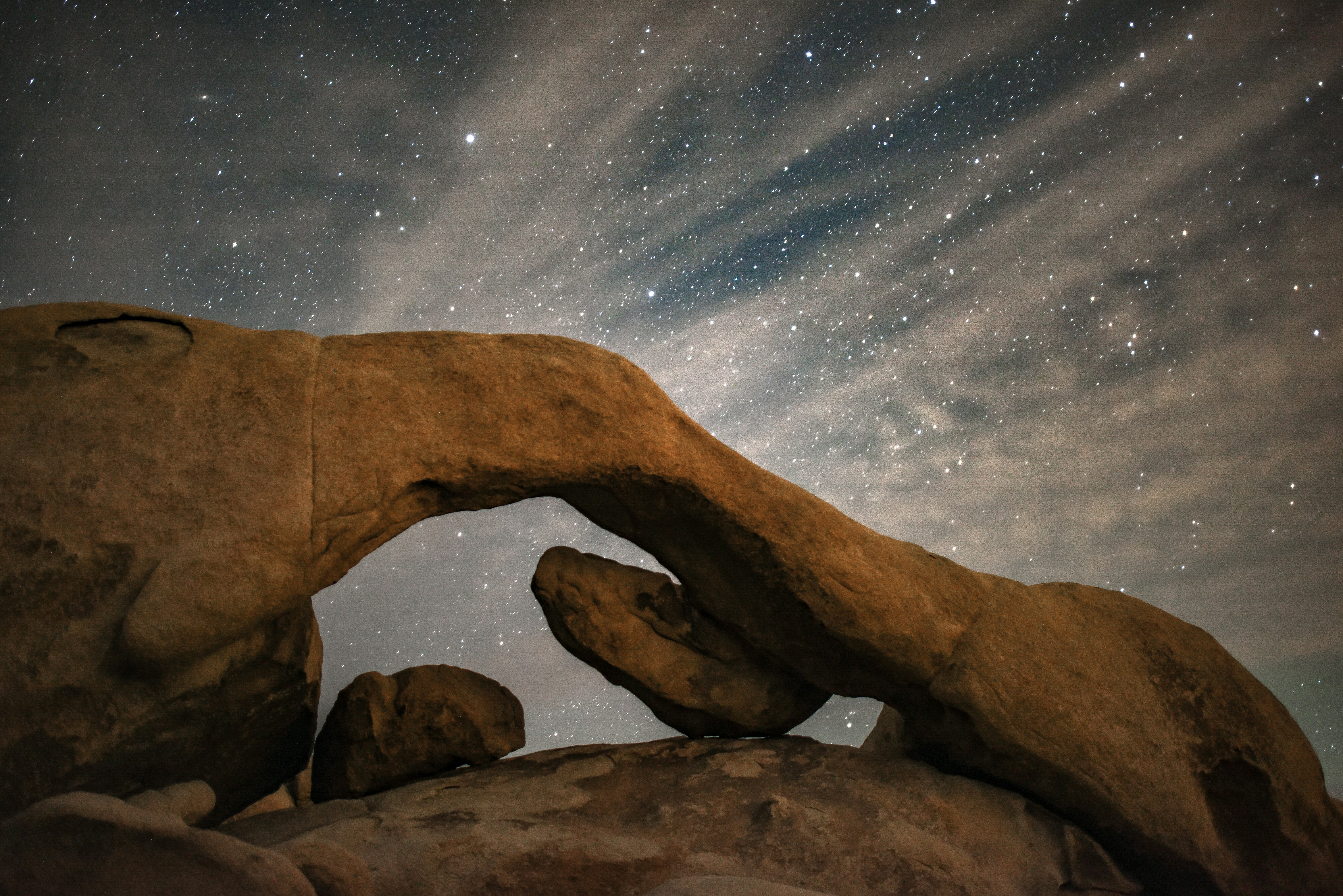 A rock formation with stars in the background photo – Free Joshua tree ...