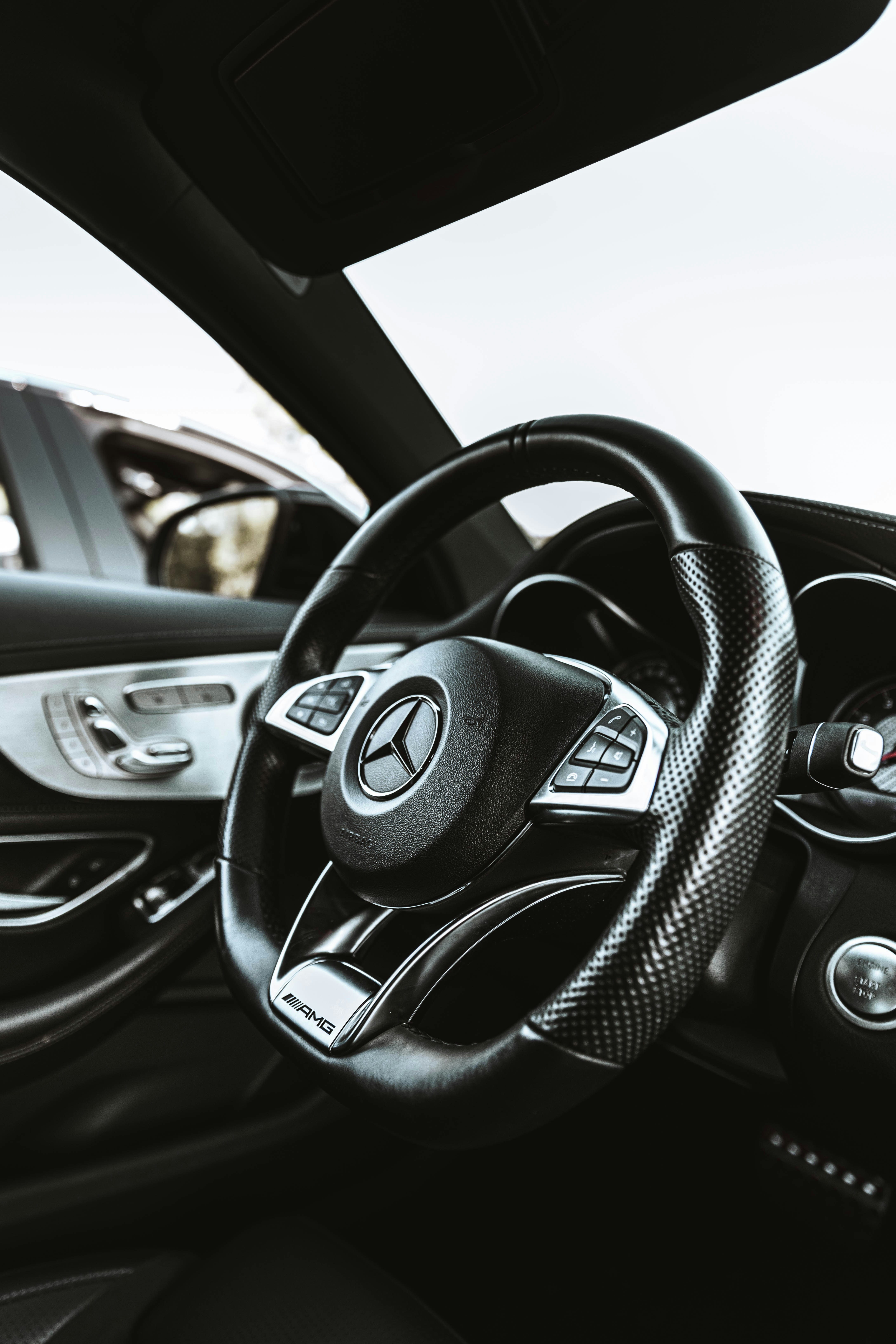 a steering wheel and dashboard of a car