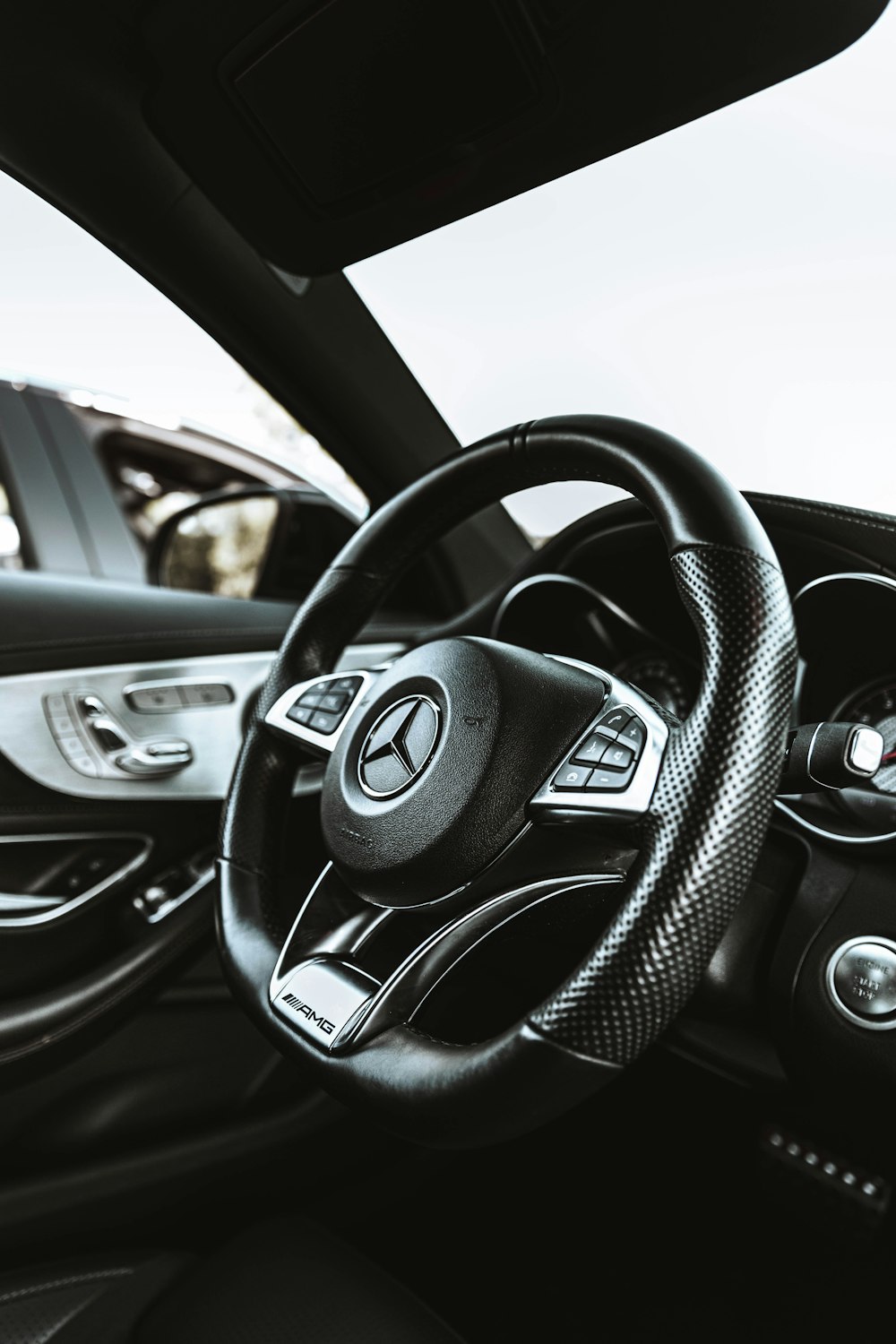 a steering wheel and dashboard of a car