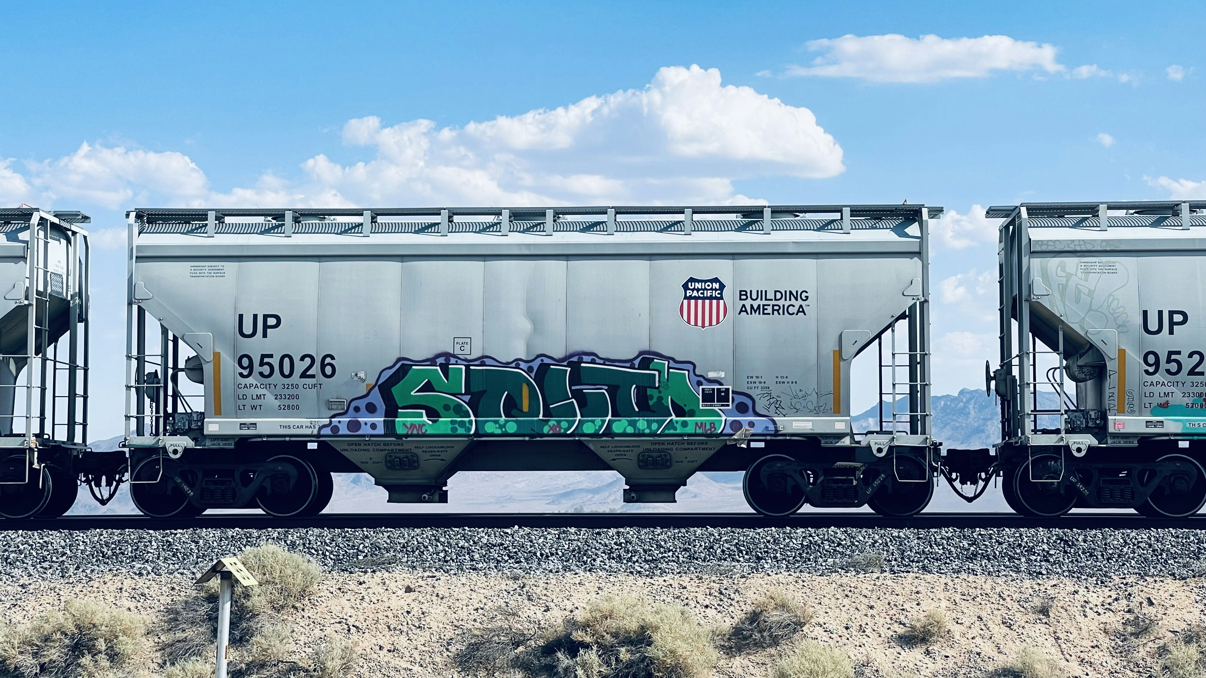 a train car with graffiti on the side of it, Montana x Mojave — #95026