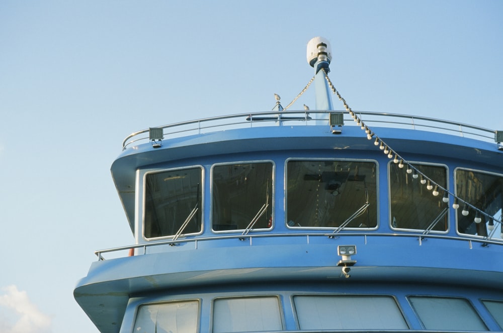 a view of the top of a blue boat