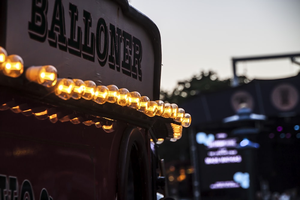 a close up of a truck with lights on it