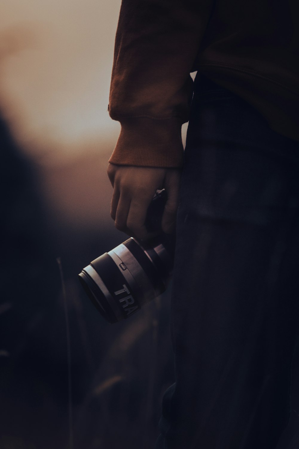 a person holding a camera in their hand