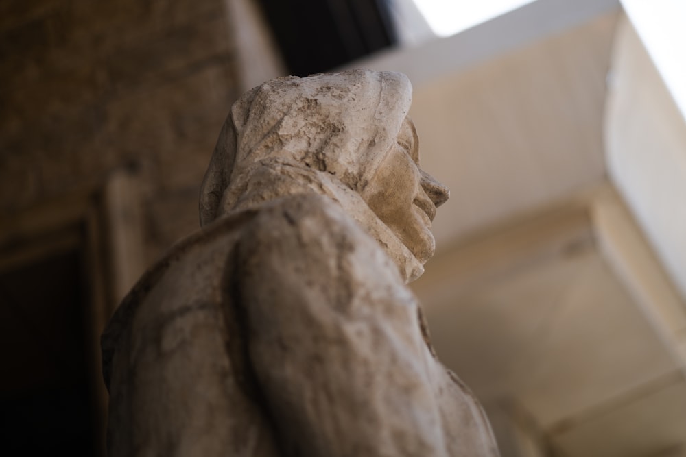 a close up of a statue of a person