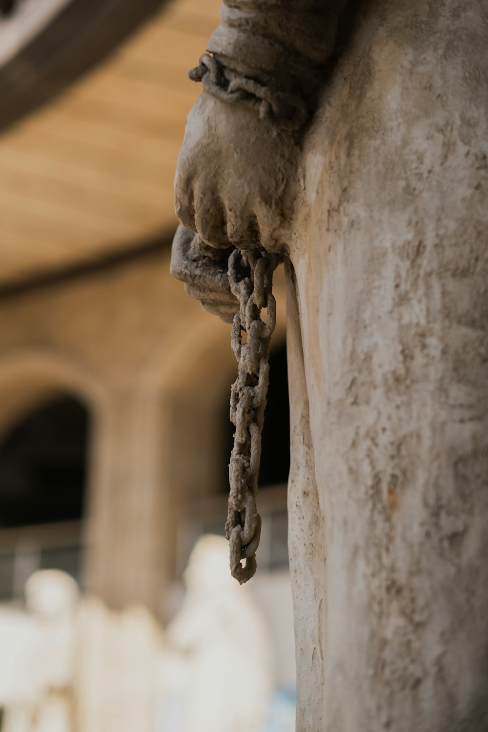 a chain hanging from the side of a building