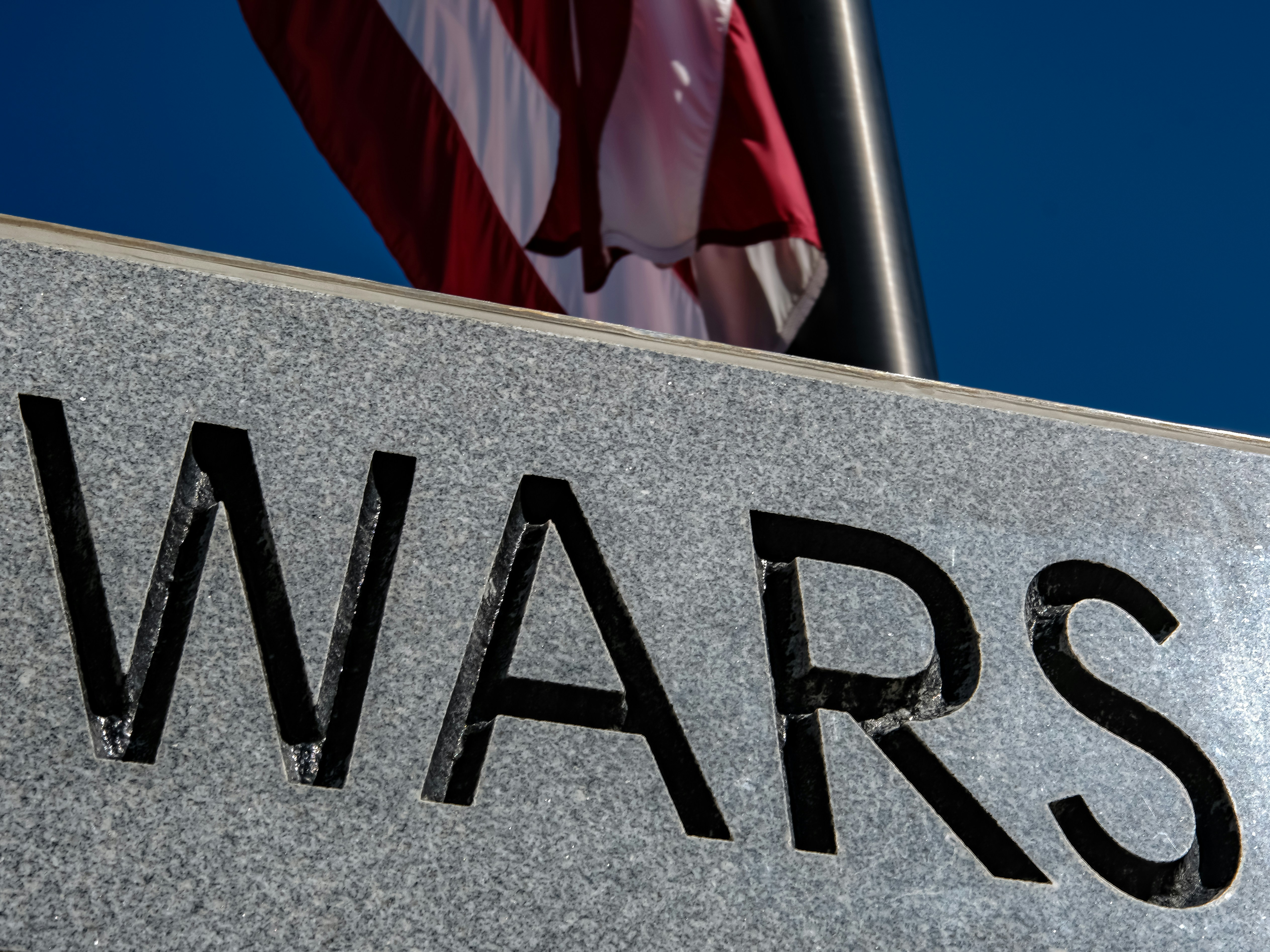 Partial shot of a World Wars memorial reading \