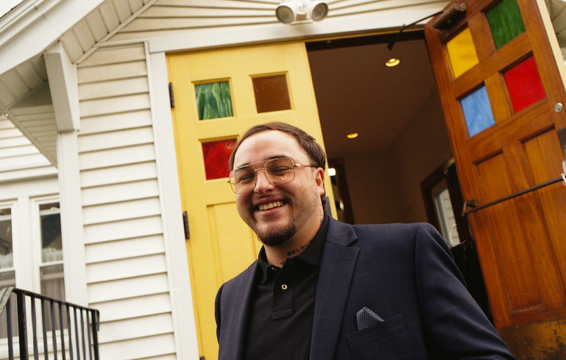 woman wearing yellow long-sleeved dress under white clouds and blue sky during daytime