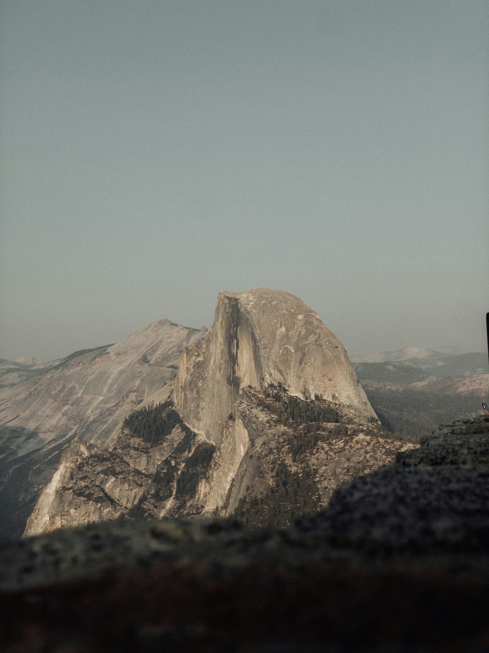 a person standing on top of a mountain