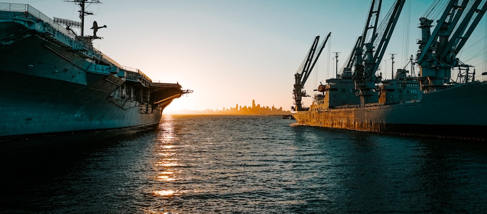 a couple of ships that are sitting in the water