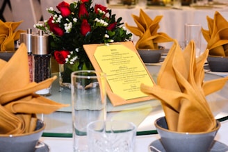 Stylish square tables with decorative centerpieces in Dammam.