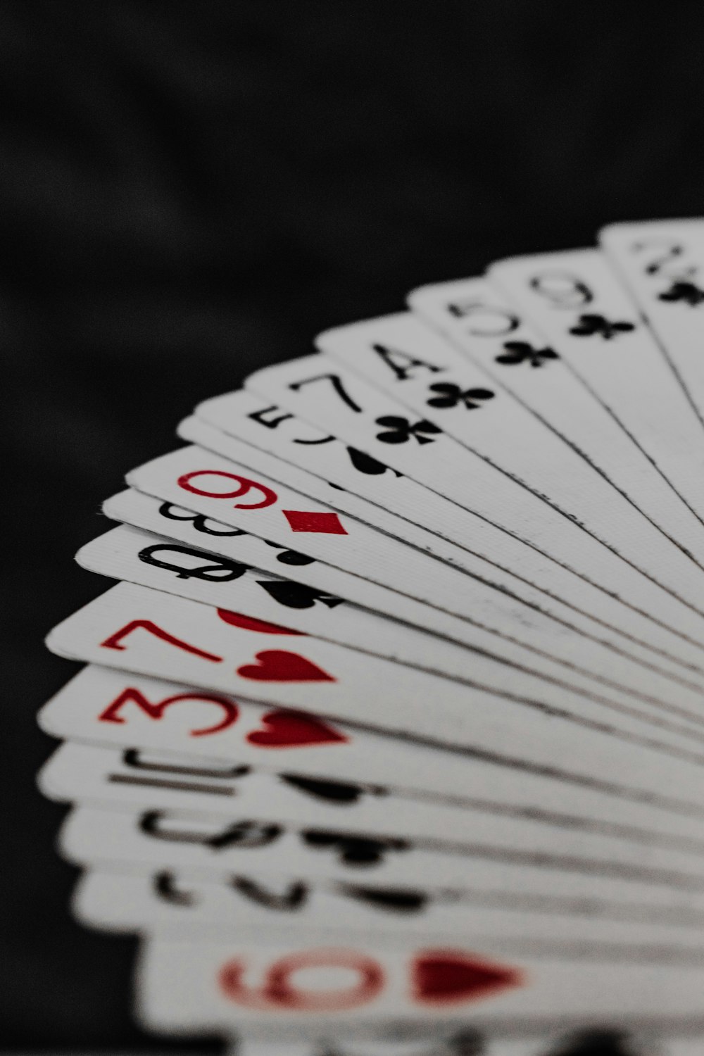 a close up of a playing card on a table