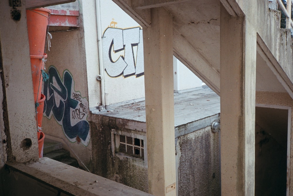 a building with graffiti on the side of it