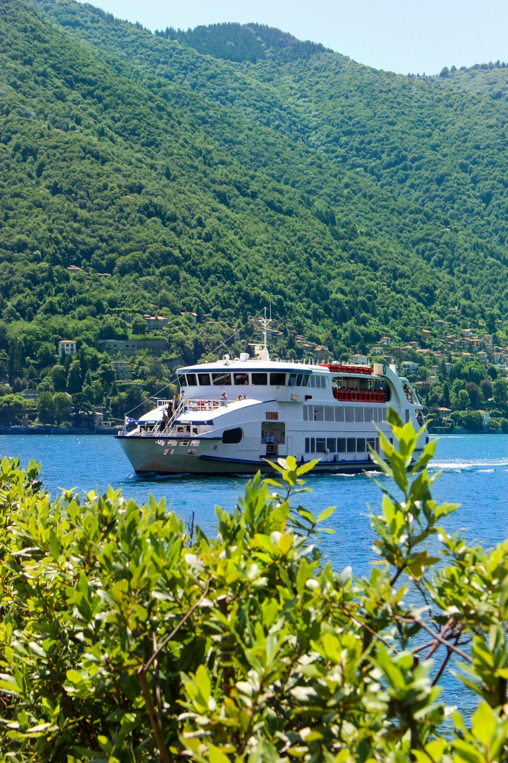 a large white boat on a body of water