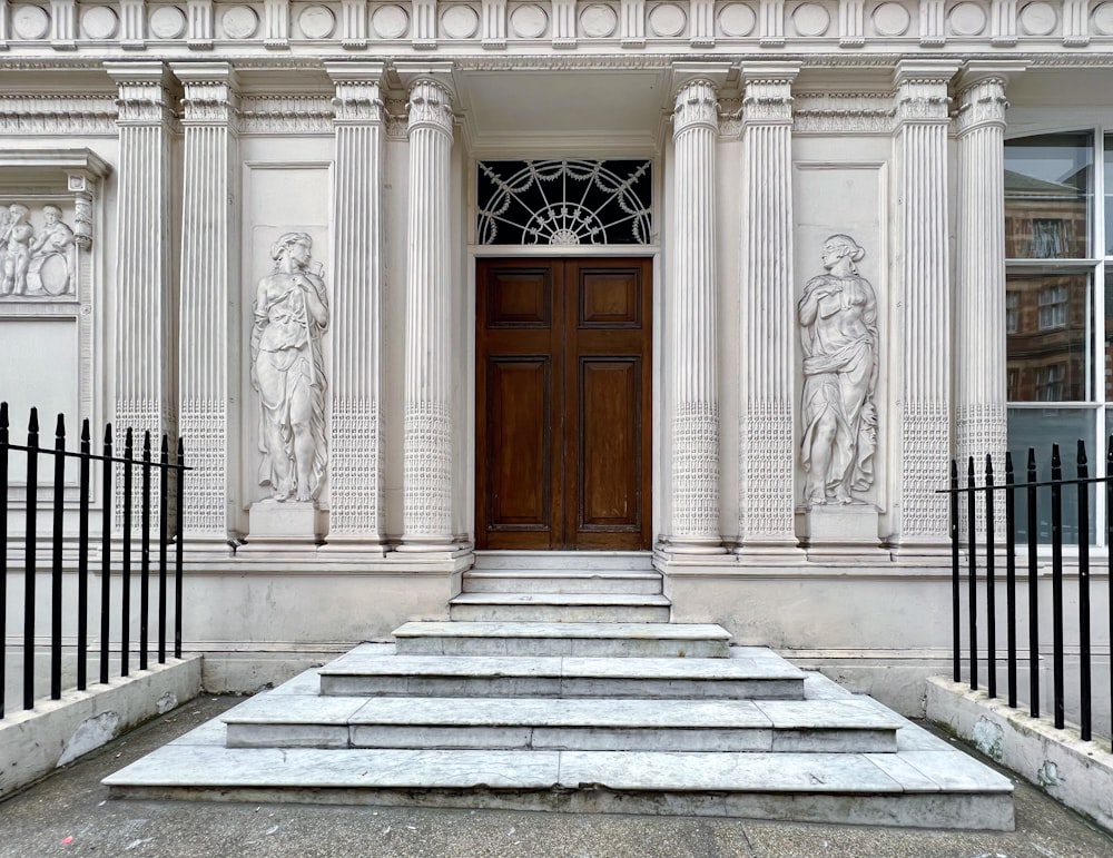 a building with a door and some steps in front of it