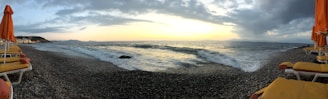 A panoramic view of Isla Canela’s golden sandy beach at sunset.