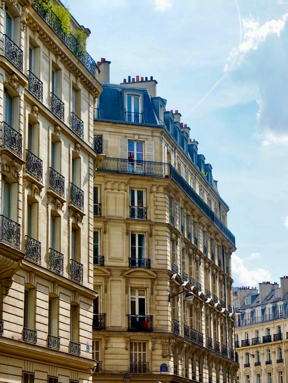 a row of buildings with balconies and balconies on top