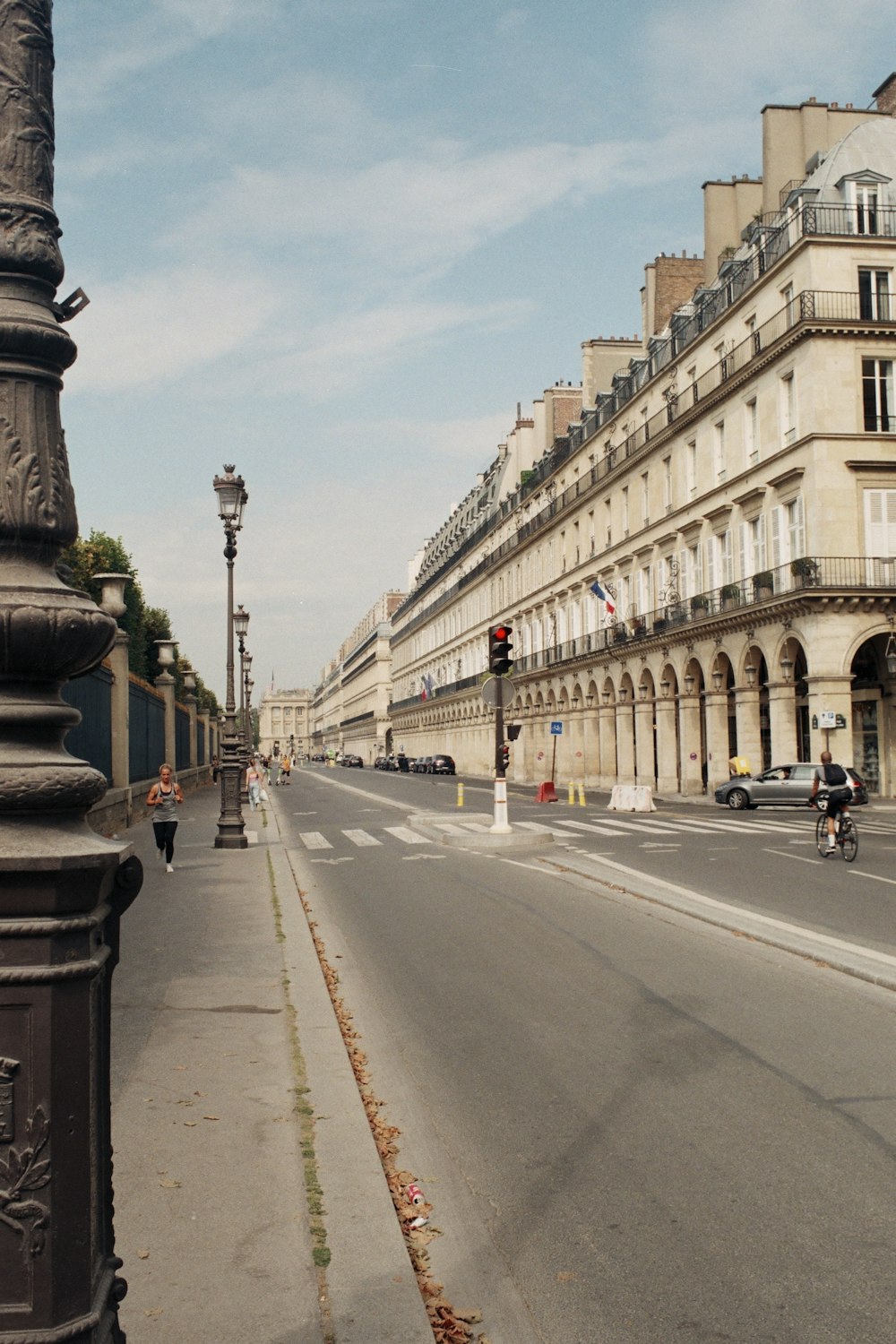 a city street with tall buildings on both sides