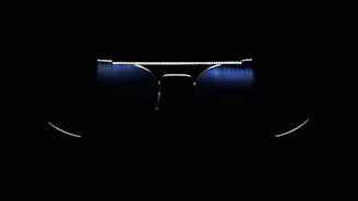 Modern eyeglass frames showcasing the photochromic lens technology in different lighting conditions.