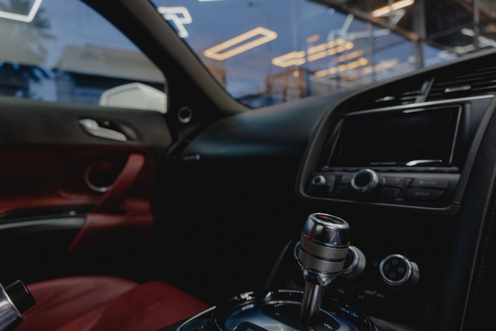 a close up of a steering wheel and dashboard of a car