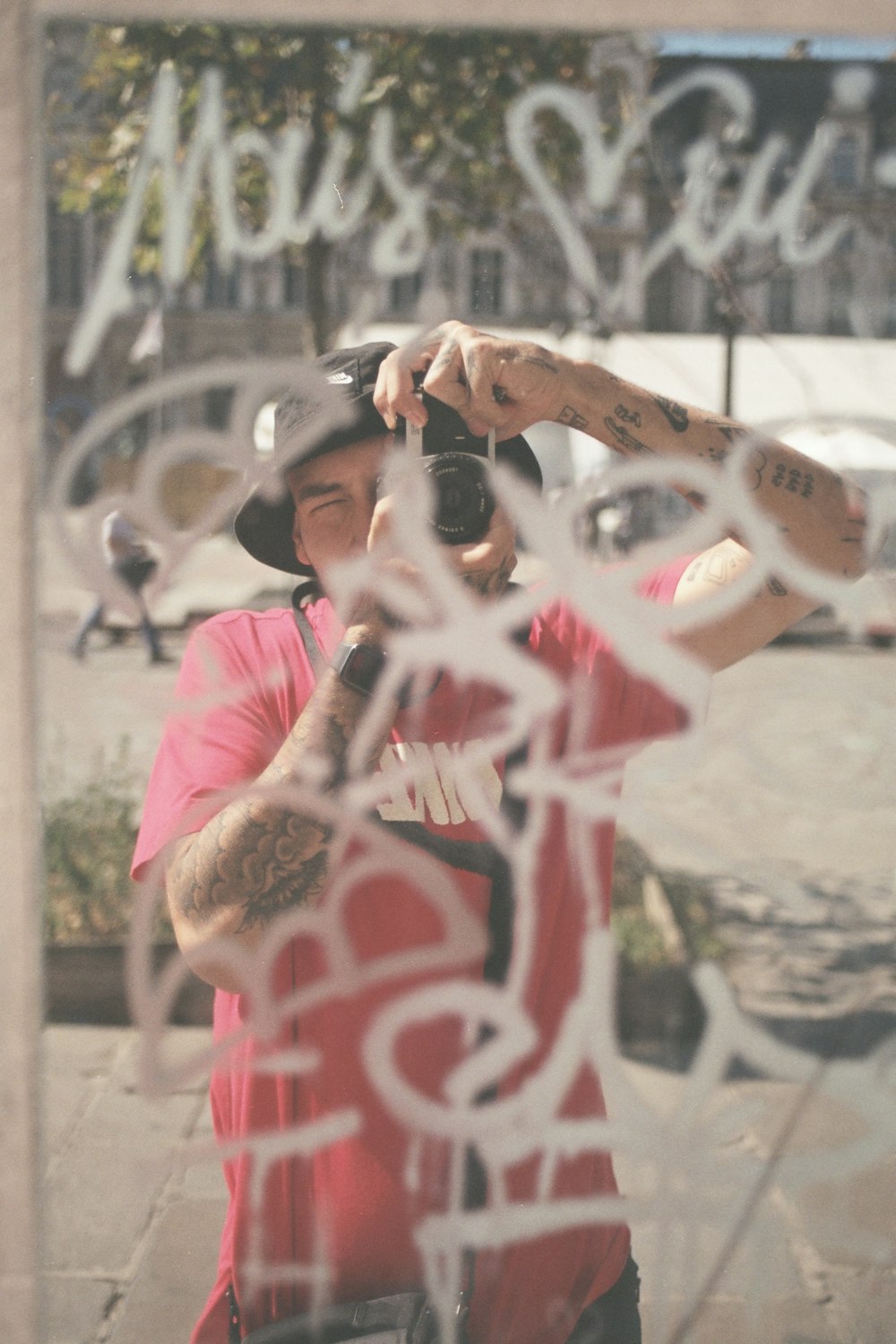 a man taking a picture of himself in a mirror