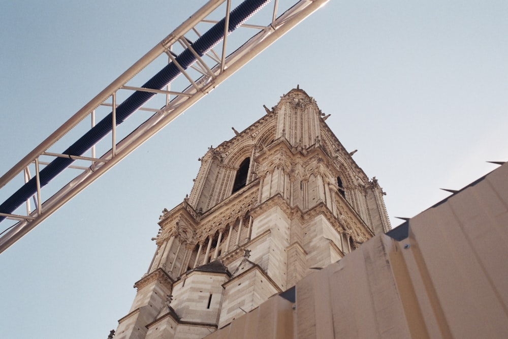 a tall tower with a clock on it's side